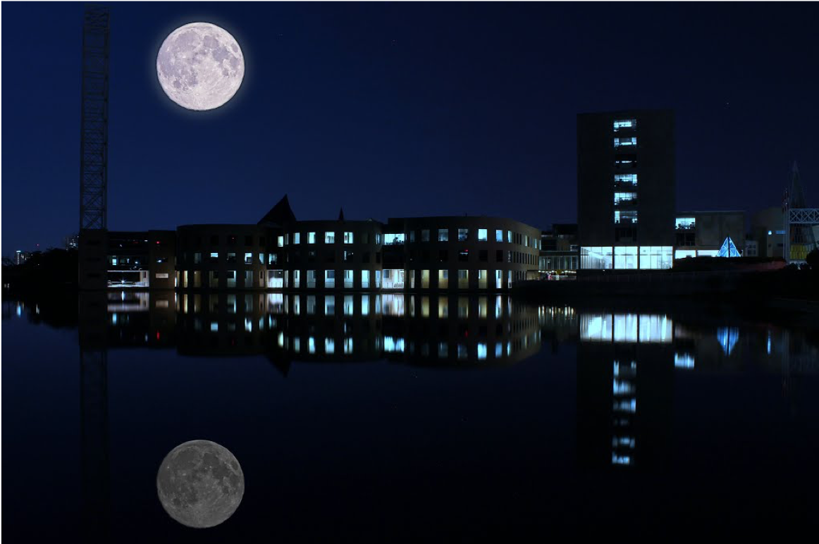 Diefenbaker Building 23 - night view with full moon of east side