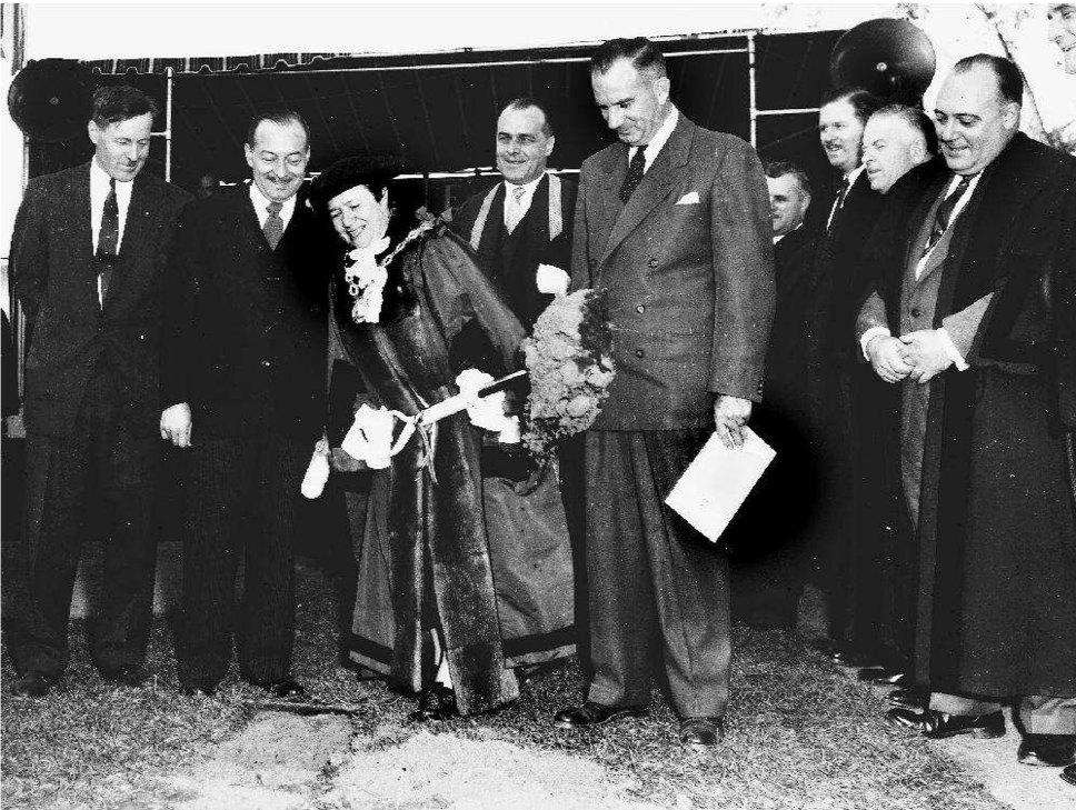 Diefenbaker Building 45 - Mayor Whitton turning sod for 1958 City Hall