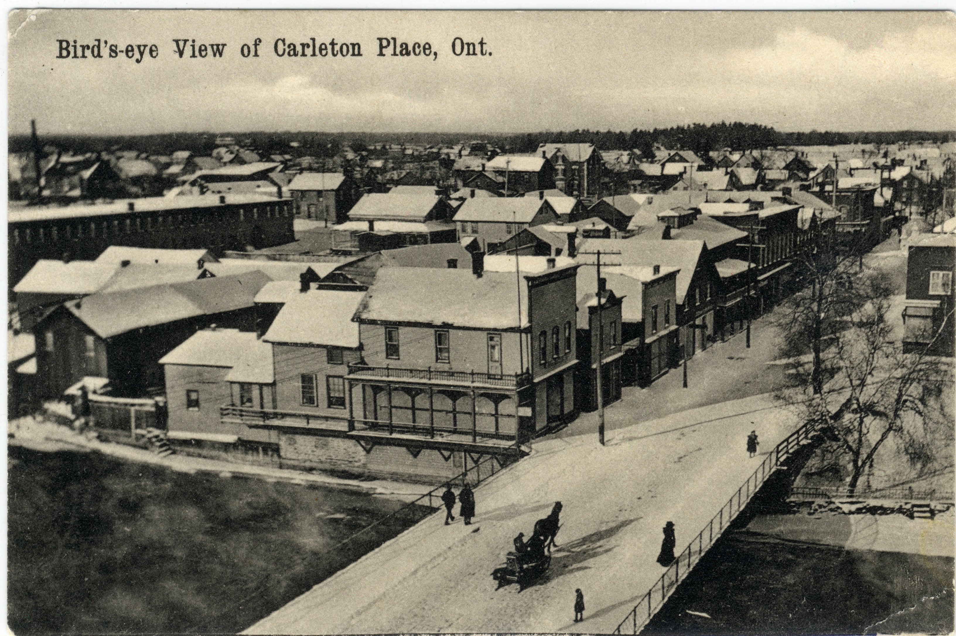 Postcard of Bridge Street looking down from the Town Hall in winter. Printed on card "Bird's-eye View of Carleton Place, Ont." Written in pencil on reverse "May 19/06" ? Search term: Main Street