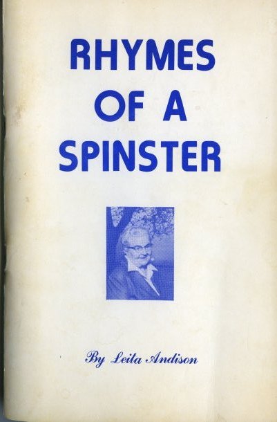 Rectangular paper book with staple binding. Printed in blue on white cover: "Rhymes of a Spinster By Leita Andison" and photograph of Leita Andison.